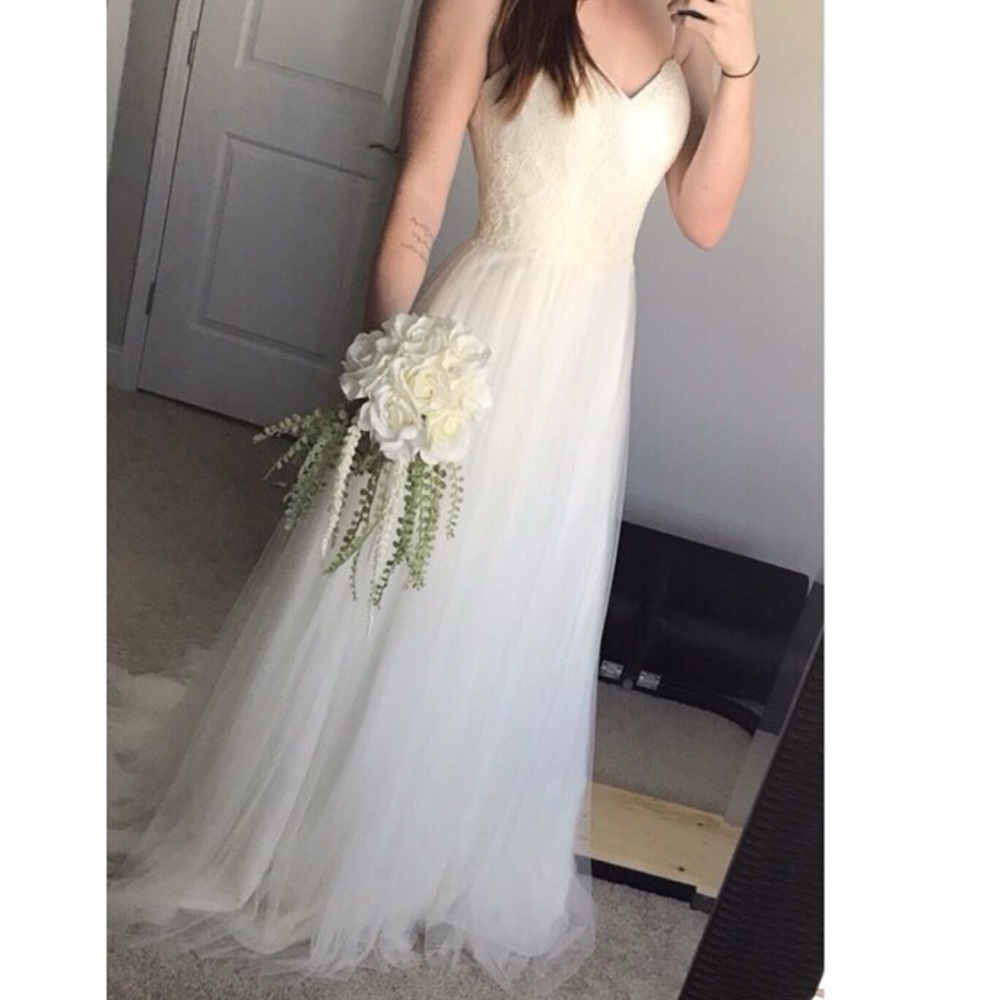 Still York Size 12 Wedding Gown. Great Condition.